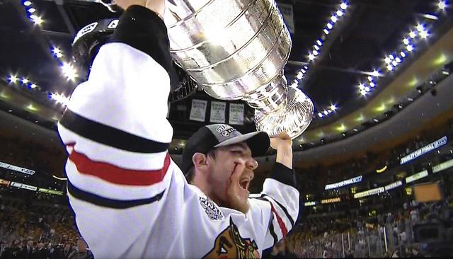 Andrew Shaw hoisting the Stanley Cup 
