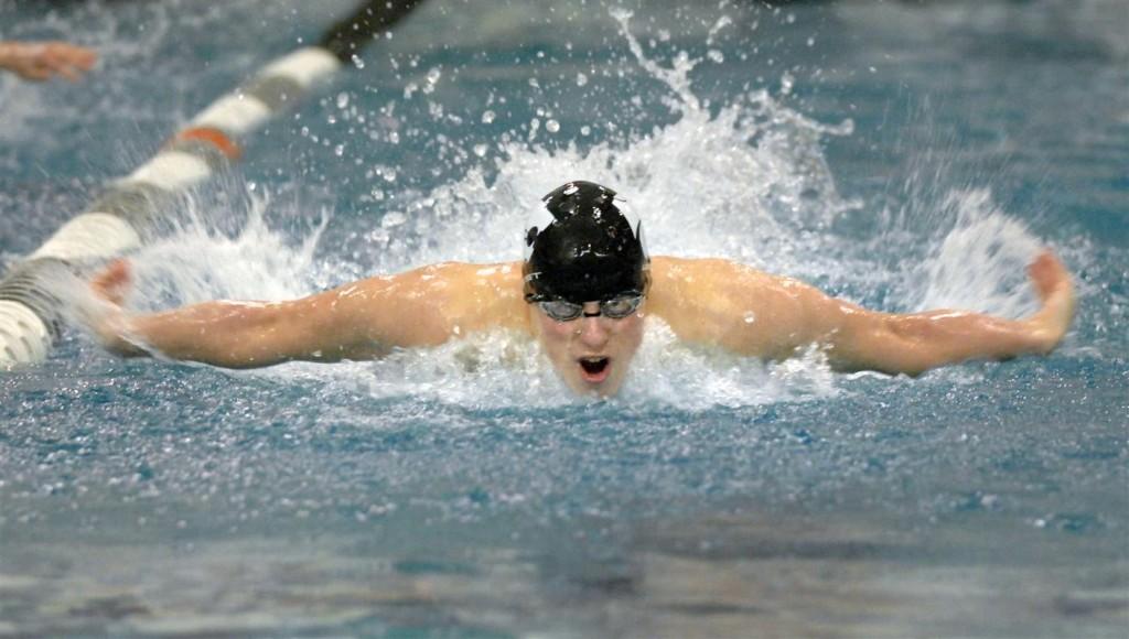 Justin+DeDianous+swims+the+100+yd.+fly+in+a+sectional+meet.+Qualifying+for+state.