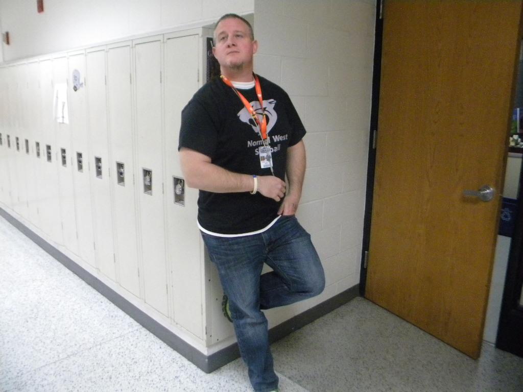 Mr. Rumps posing next to a locker
