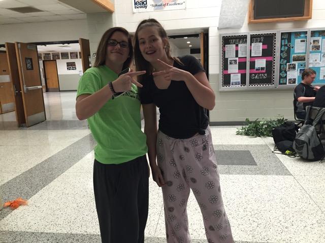 Juniors, Taylor Maze and Julia Abraham, showing all the spirit they have during homecoming spirit week in their pajamas. 