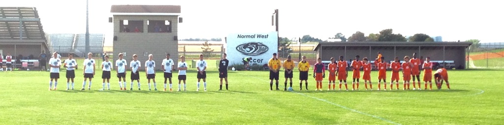 Normal West boys soccer line up against Peoria Manual. 