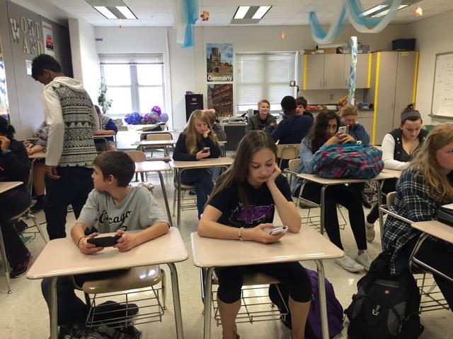 Ms. Woolums FMP homeroom pays no attention to her or their FMPs because they are too distracted by their phones. Photo credit: Briana Turcotte