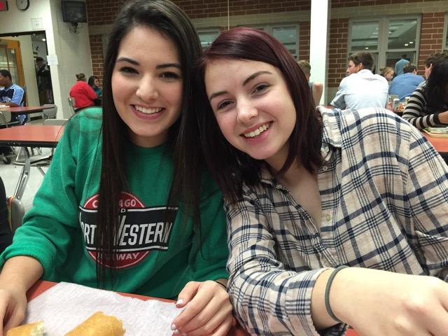Senior Abby Craig and Junior Sarah Yoder enjoy lunch while answering questions for the Paw Print.