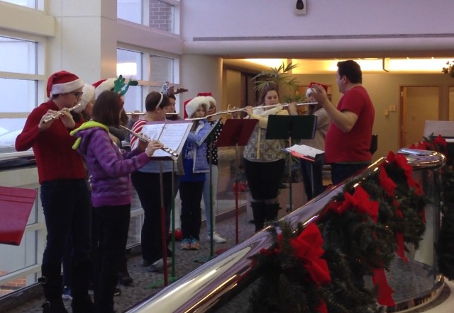 Normal West flute choir playing at Bromenn Hospital.