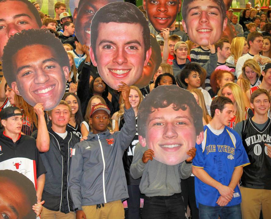 The NCWHS student section cheers on their favorite Boys Basketball seniors. 