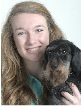 NCWHS senior Casey Engelhorn poses with her dog, Robert.