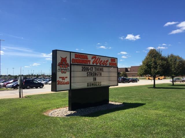 The sign in front of Normal West High School that shares the theme for the school year ‘Strength in Numbers.’
