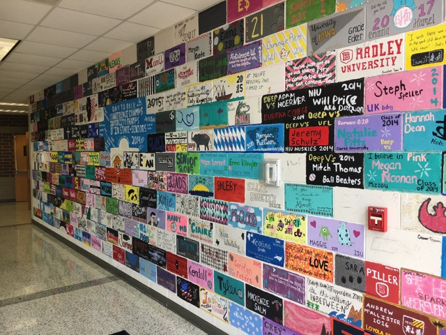 As one of the senior activities, seniors paint bricks in the senior hallway at West Fest. This is one of the ways seniors leave their mark at Normal West. 