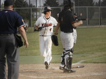 Sophomore Will Kaferr scores a run in the third inning of Thursday's game.