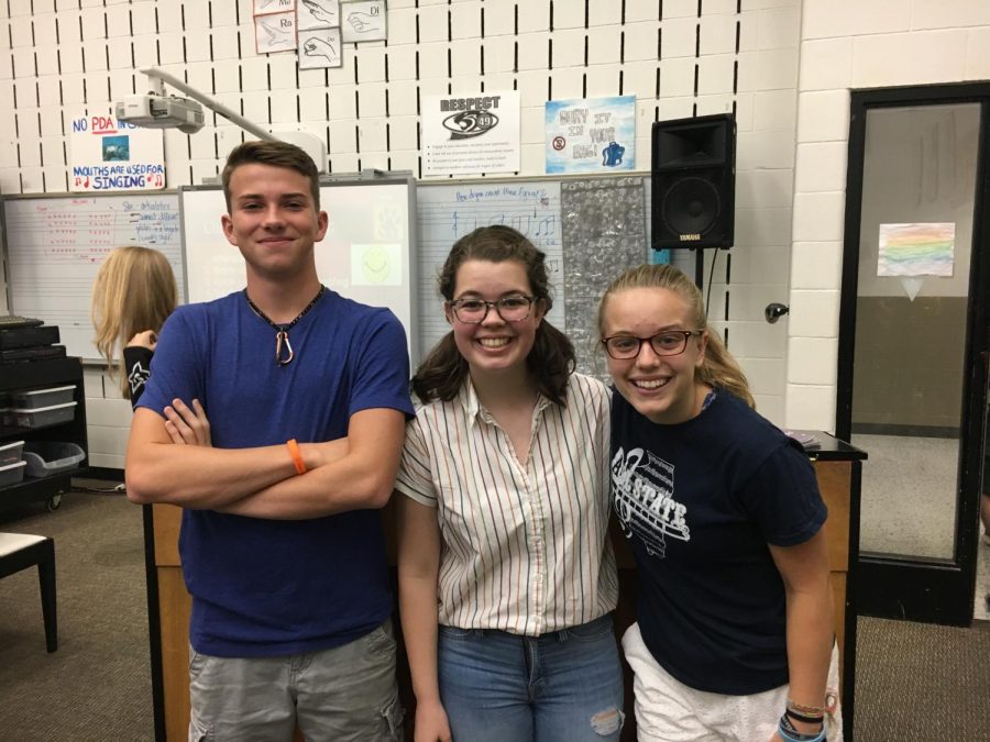 (left to right) Levi Miller, a member of Fully Diminished, Katherine Moody, a member of Colla Voce, and Leah Grehan, a member of Jazz Voice. Photo by Cameron Shandrow