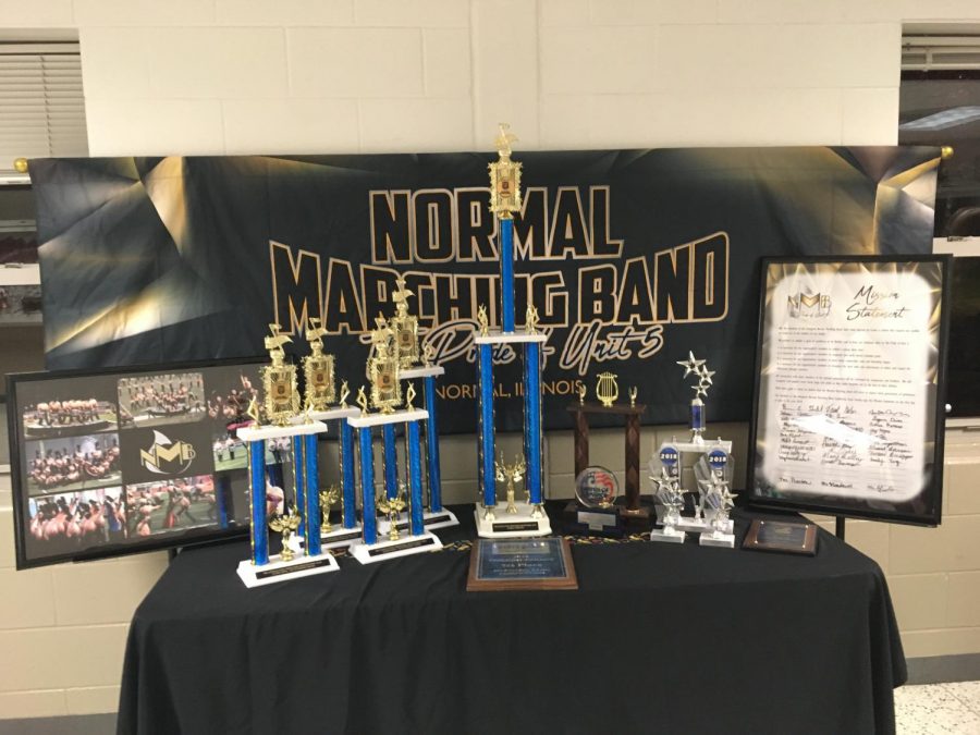  The NMB’s banner, trophies, photos and mission statement on display at the Unit 5 Music Parents Spaghetti Supper at West. Photo by Ariana South.