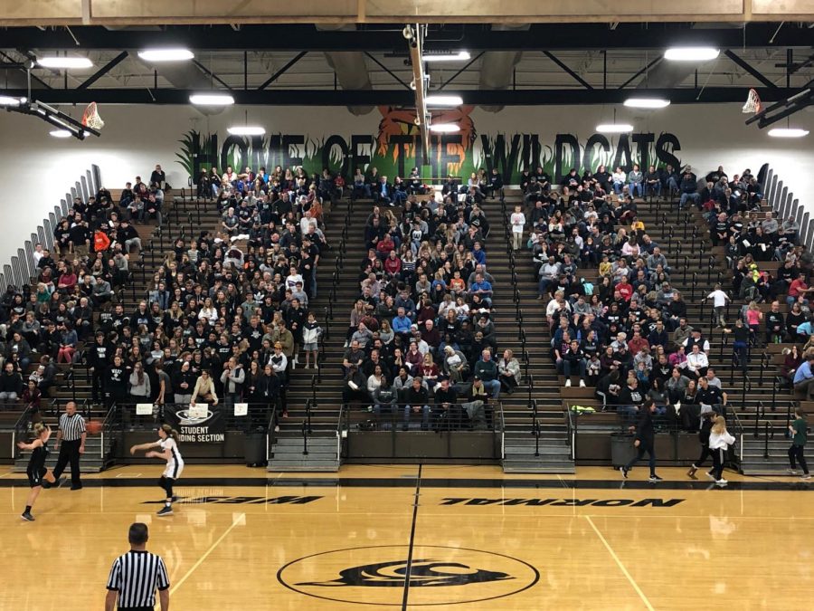 Wildcat fans pack the stands in support of the girls basketball team.  The JV team was in a tragic bus accident the previous night.  
