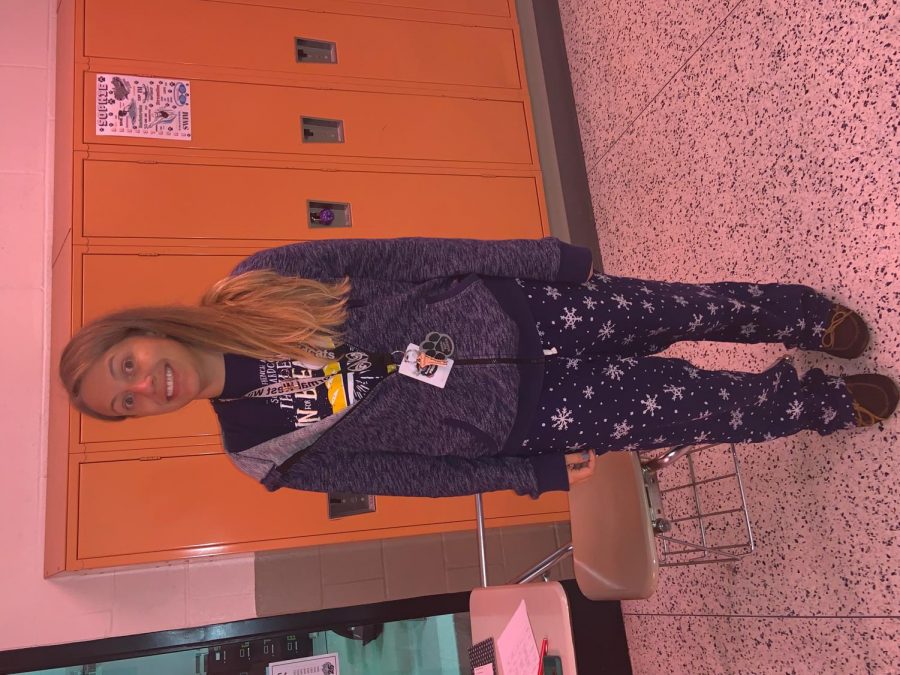 French teacher Mm. Soard shows off her cozy outfit as she celebrates her Homecoming spirit.
