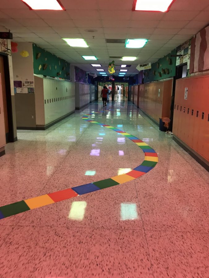 The senior hallway is decorated as the candy land board game as the homecoming theme is board games  