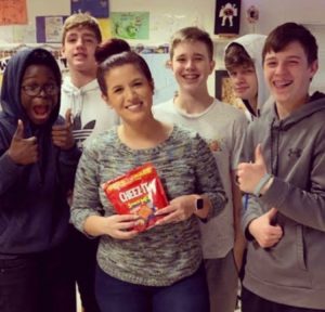 Ms. Primo with students that brought her a snack to show their appreciation.