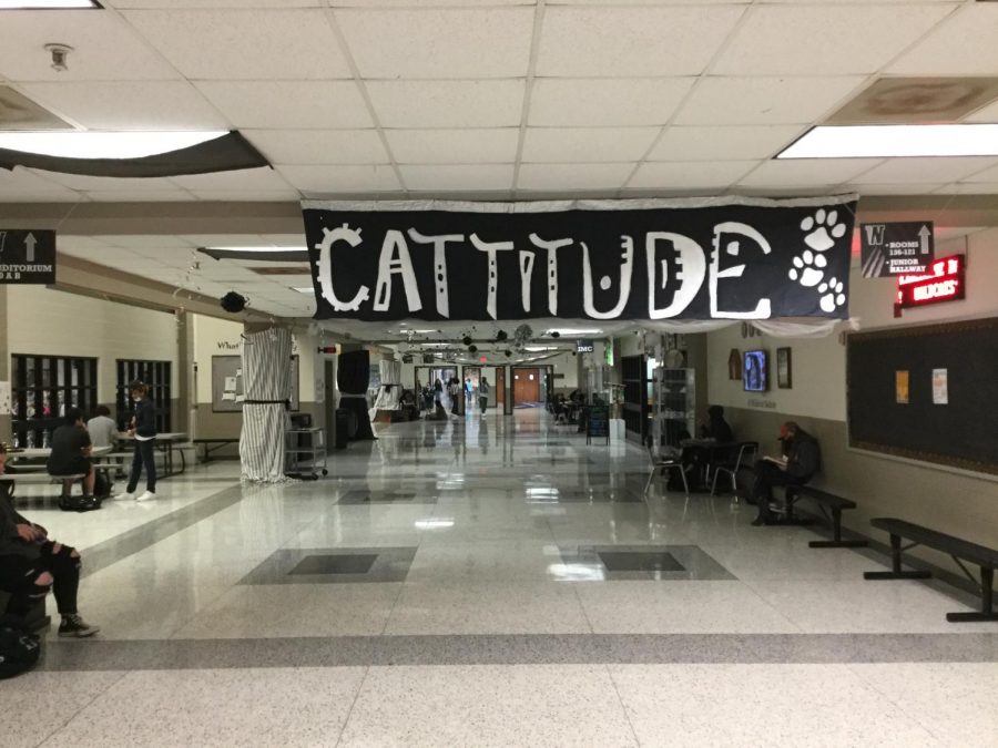 The Cattitude banner hanging in the atrium as homecoming decoration