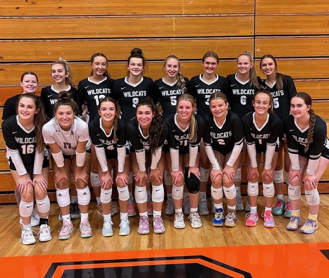 Above the 2023 NCWHS Varsity volleyball team poses after securing their first Big12 Conference title since 2020. 