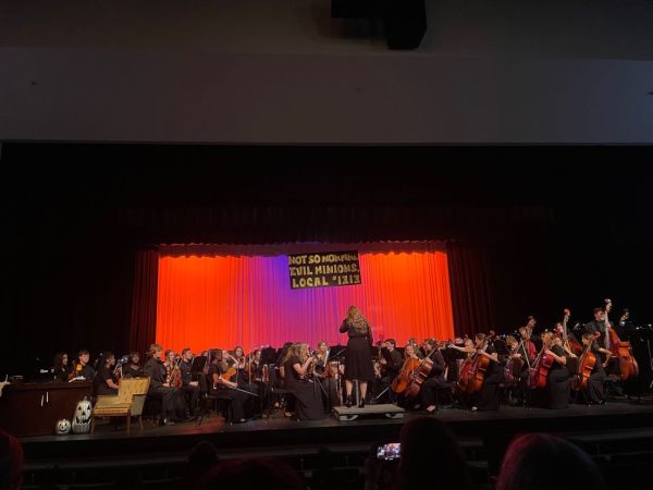 3rd year Orchestra instructor, Ms. Kimberley Boehm conducts the Normal West Orchestra at their annual Hauncert.