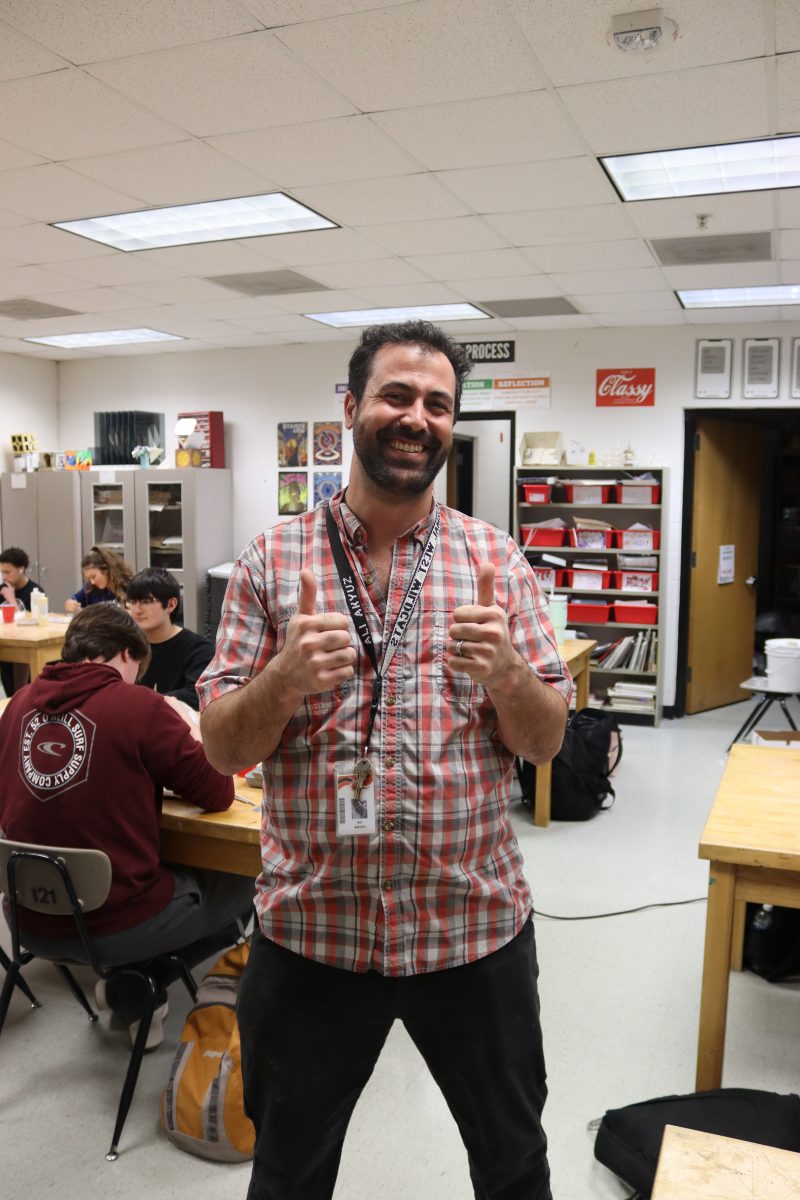 During 7th hour art class, Mr Akyuz (or Mr. A. as many students call him), takes the time to converse with his students about their artistic mediums. Mr. A. is one of many beloved teachers here at West!