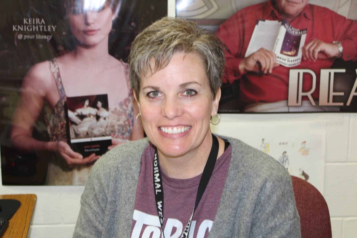 During AP Literature class, Mrs. Remy Garard poses for her feature article. Garard is a veteran teacher at Normal West who is also currently pursuing her Doctorates degree.