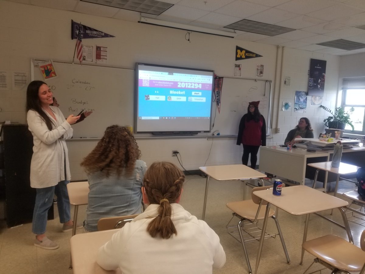 The ASL Club was started by Sophomore Ali Garcia and is sponsored by Mrs. Sara Maynerich. Above, at an average Monday meeting, they are about to play a game to learn animal signs.
