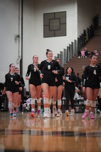 Senior Ellie Rink is a known leader for the Wildcats on the court, but Head Coach Kelsey Mueller also notes her leadership bleeds into off-the-court activities, as well. Above, Rink leads her team through warm-ups. 