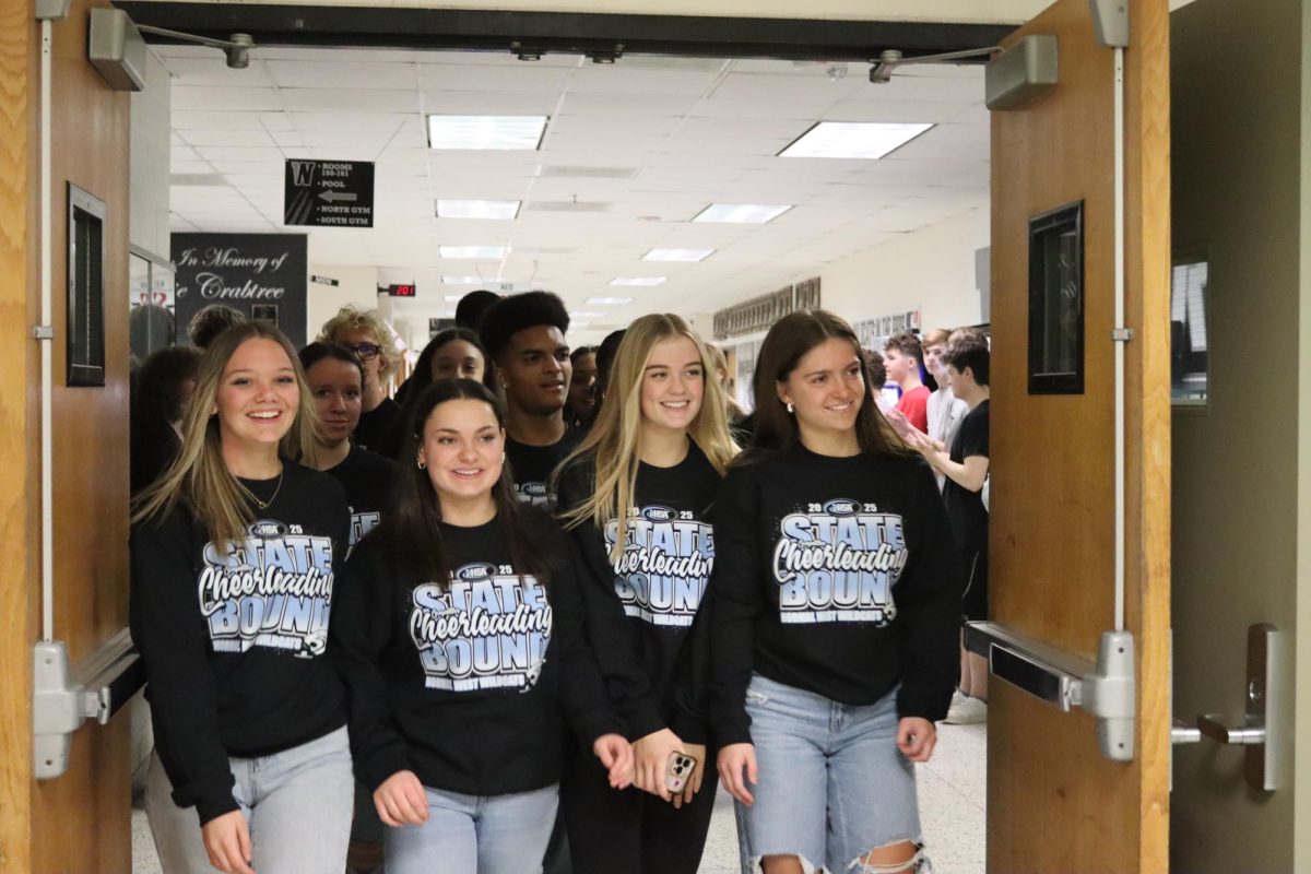 On Friday, Feb. 7 at 6:55pm  in Grossinger Arena, the Normal West Cheer Team will be performing at the state finals. Today, the students and staff lined the halls to celebrate the squad as they prepare for their competition.