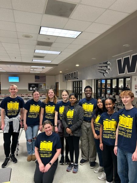 Normal West's National English Honor Society have taken their volunteer requirements to the next level. At their latest volunteer opportunity on Saturday, April 12, they worked another Eastern Illinois Foodbank.