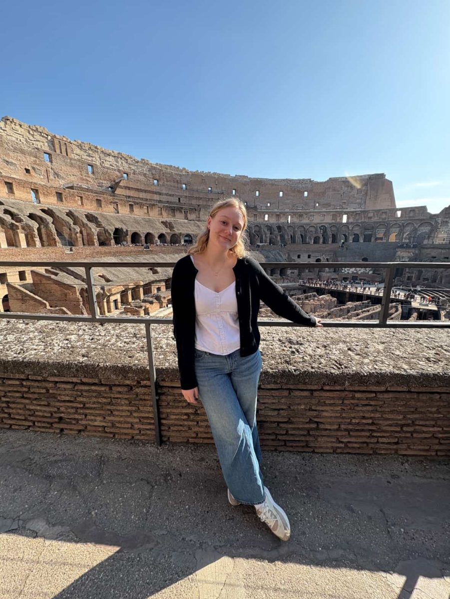 Above, Katie Munson, who graduated in December of 2024 stands outside the Roman Colosseum.
