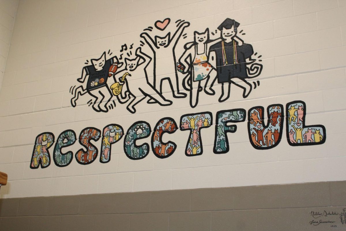 Photograph by Jo Brown
The “West Improvement Plan” has taken off with the goal of making small improvements to Normal West. One major building improvement was a mural in north stairwell. Two Normal West 2025 graduates, Natalie Sokulski and Lena Ganschow came in over the summer to bring this mural to life.