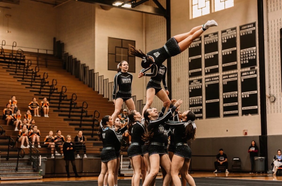 The Normal West competitive cheer team is getting set for their sectional competition tomorrow, January 31. at Edwardsville High School. The team will hit the mats at 2:48pm.