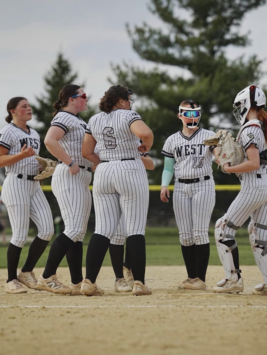 With a new coach and many new faces to the program, the Normal West softball team is still working on 'finding themselves,' but with a close-knit group and a great coaching staff, the team remains optimistic.